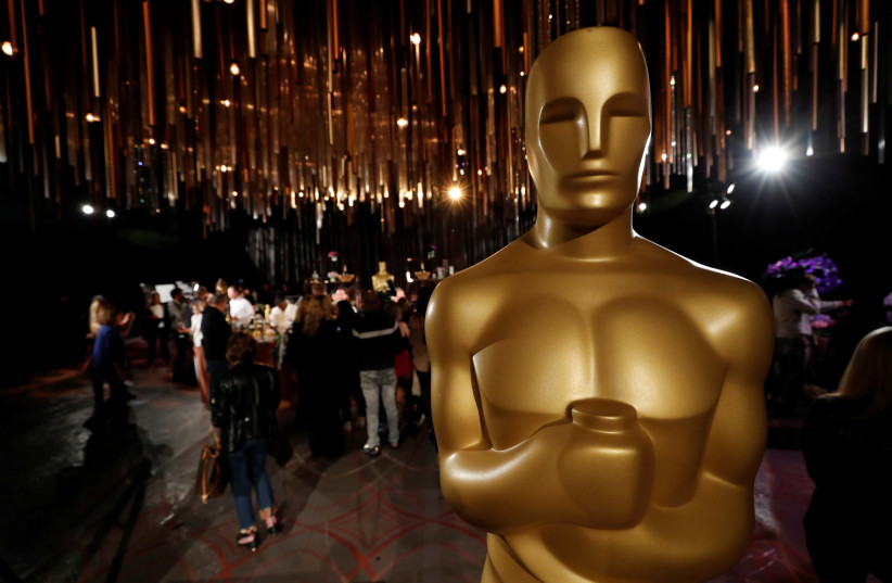 An Oscar statue is pictured during a media preview of this year's Academy's Governors Ball in Los Angeles, California, U.S., January 31, 2020. (photo credit: MARIO ANZUONI/REUTERS)