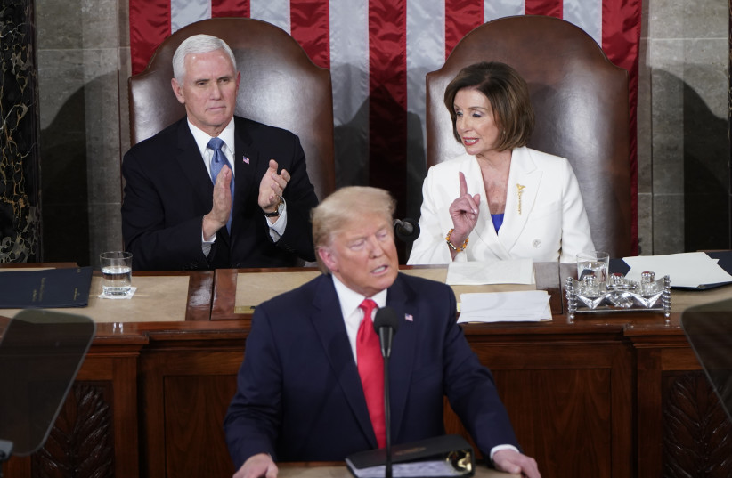 Vice President Mike Pence and Speaker of the House Nancy Pelosi watch as President Donald Trump delivers the State of the Union address to a joint session of Congress on February 4, 2020 (photo credit: REUTERS)