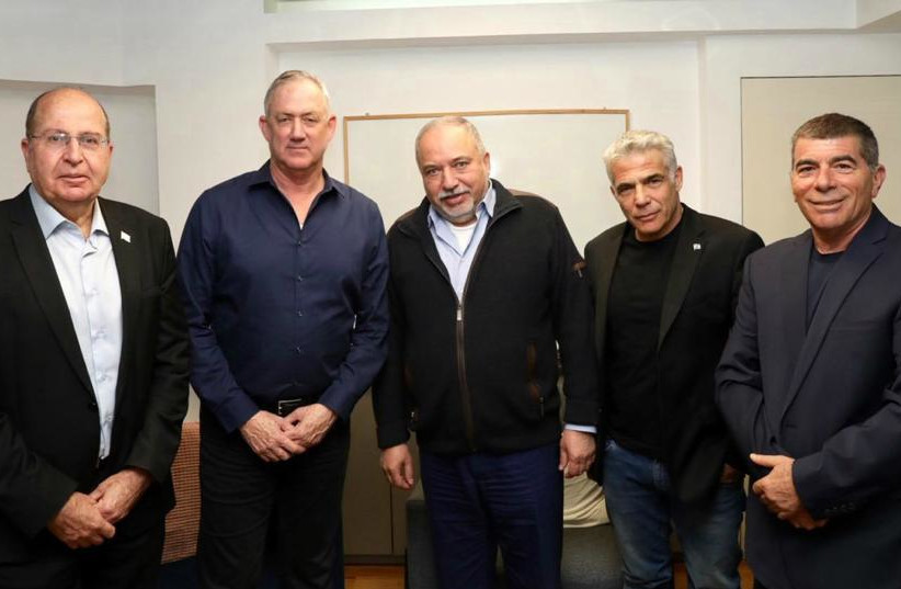 Yisrael Beytenu chairman Avigdor Liberman [C] with Blue and White top ranking officials [from Left to Right] Moshe Ya'alon, party leader Benny Gantz, Yair Lapid, Gabi Ashkenazi (photo credit: ELAD MALKA)