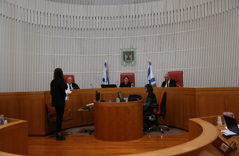 The High Court of Justice during a hearing (photo credit: ALEX KOLOMOISKY / POOL)
