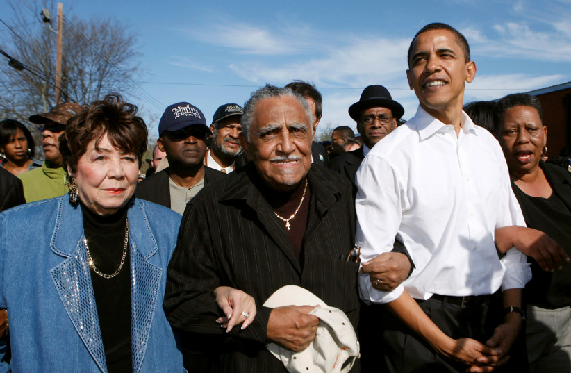 Reverend Joseph Lowery (C) walks with former president and then-senator Barack Obama (R) and others during a march commemorating the 1965 Selma-Montgomery Voting Rights March in Selma, Alabama, March 4, 2007 (photo credit: REUTERS/LEE CELANO/FILE PHOTO)