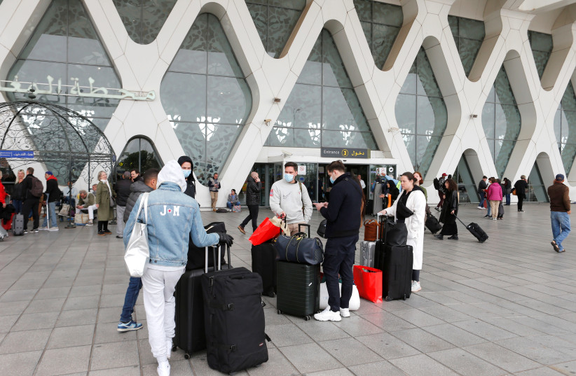 Tourists wait to be repatriated to their countries from Marrakech airport, Morocco (photo credit: YOUSSEF BOUDLAL / REUTERS)