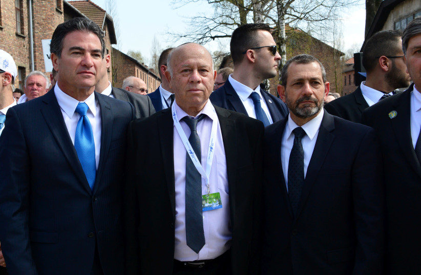 DR. SHMUEL ROSENMAN, co-founder and chairman of the International March of the Living, flanked by Mossad head Yossi Cohen (left) and Shin Bet head Nadav Argaman in 2018 (photo credit: YOSSI ZELIGER)