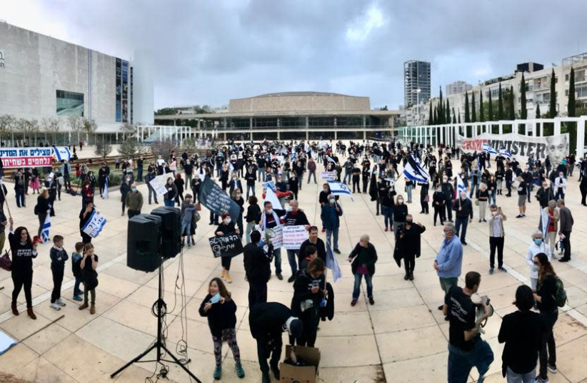 A Black Flag protest near Habima National Theater in Tel Aviv on April 16 2020  (photo credit: AVRAHAM SASSONI)