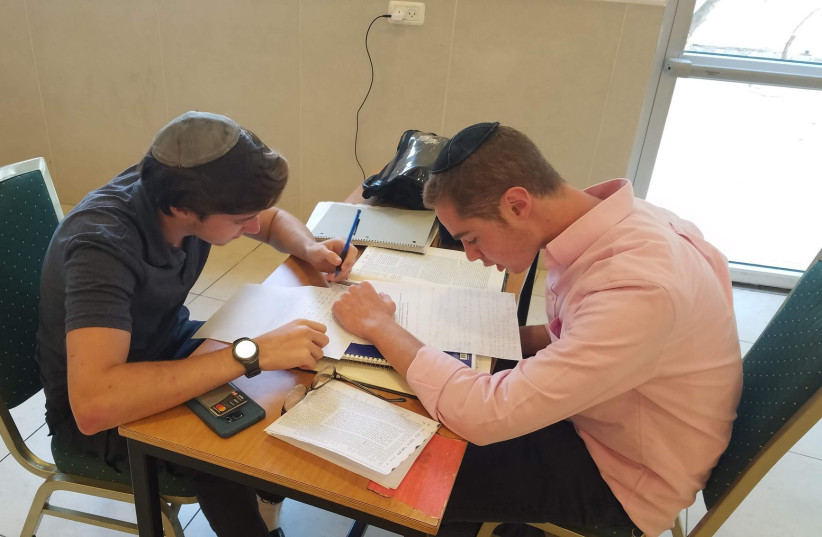 Students learning at Yeshivat Migdal HaTorah (photo credit: YESHIVA MIGDAL HATORAH)