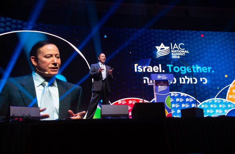 Adam Milstein addresses the Israeli-American Council National Summit, which took place in Maimi, Florida, in December 2019 (photo credit: NOAM GALAI)