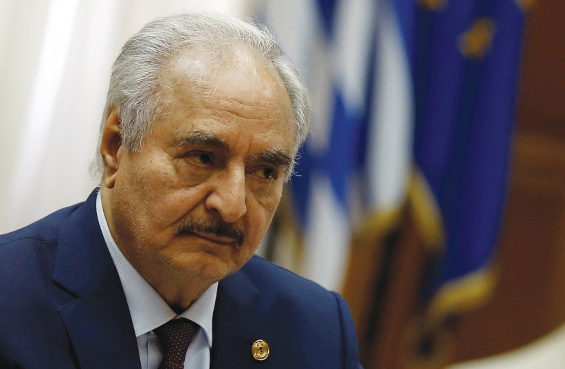 LIBYAN COMMANDER Khalifa Haftar meets Greek Prime Minister Kyriakos Mitsotakis (not pictured) at the parliament in Athens. (photo credit: REUTERS)