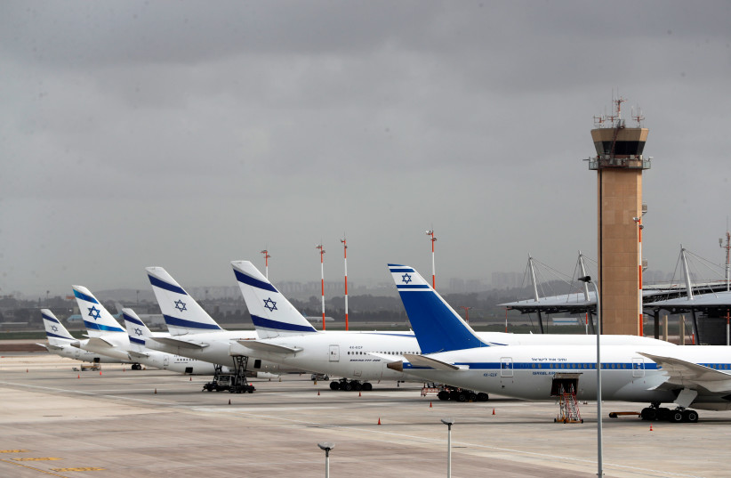 El Al Israel Airlines planes are seen on the tarmac at Ben Gurion International airport in Lod, near Tel Aviv, Israel March 10, 2020. (photo credit: REUTERS/RONEN ZEVULUN)