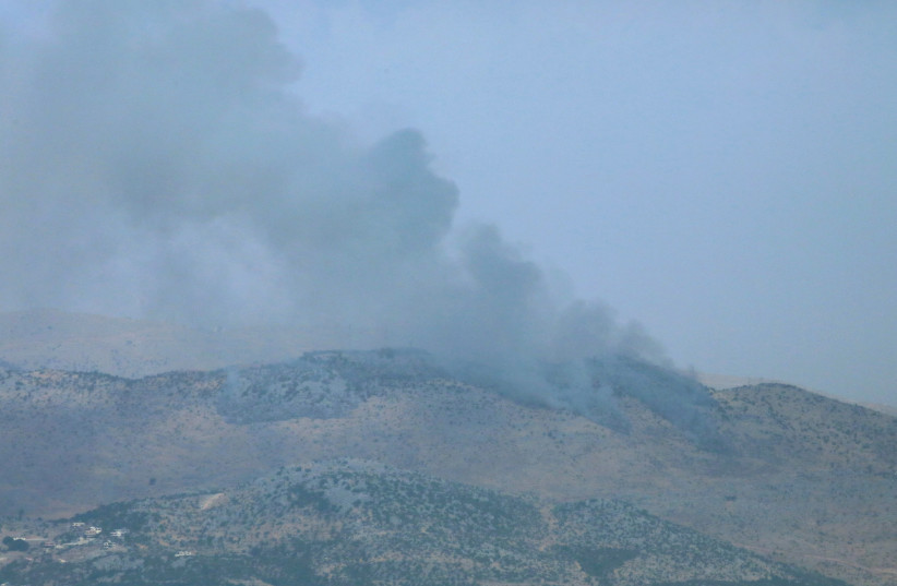 Smoke rises from the disputed Shebaa Farms area as seen from Marjayoun village in southern Lebanon, Lebanon July 27, 2020. (photo credit: REUTERS/KARAMALLAH DAHER)