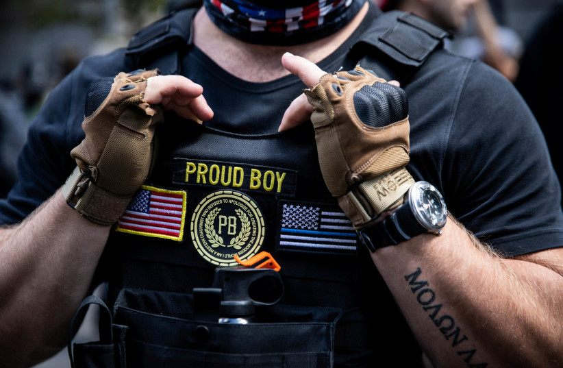 Proud Boys and supporters of the police participate in a protest in Portland, Oregon, U.S., August 22, 2020 (photo credit: REUTERS/MARANIE STAAB)