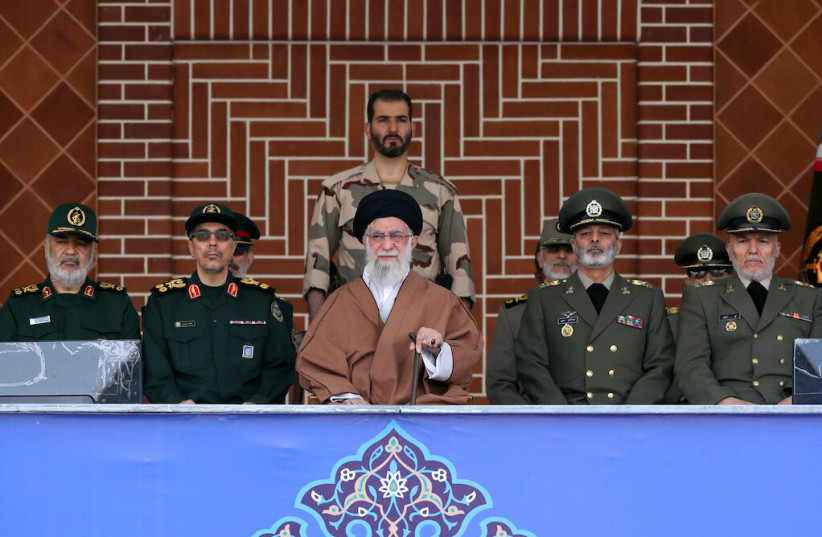 Iran's Supreme Leader Ayatollah Khamenei surrounded by military officials (photo credit: KHAMENEI.IR)