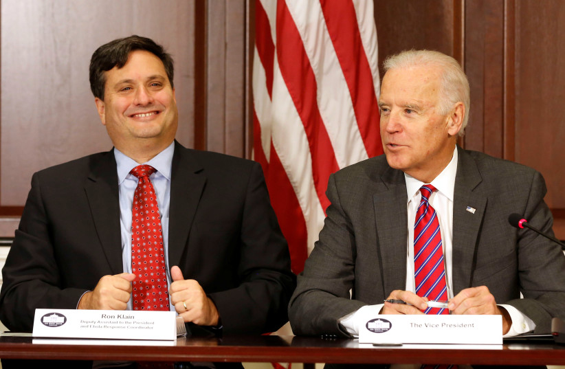 US Vice President Joe Biden (R) is joined by Ebola Response Coordinator Ron Klain (L) in the Eisenhower Executive Office Building on the White House complex in Washington, US November 13, 2014.  (photo credit: REUTERS/LARRY DOWNING/FILE PICTURE)