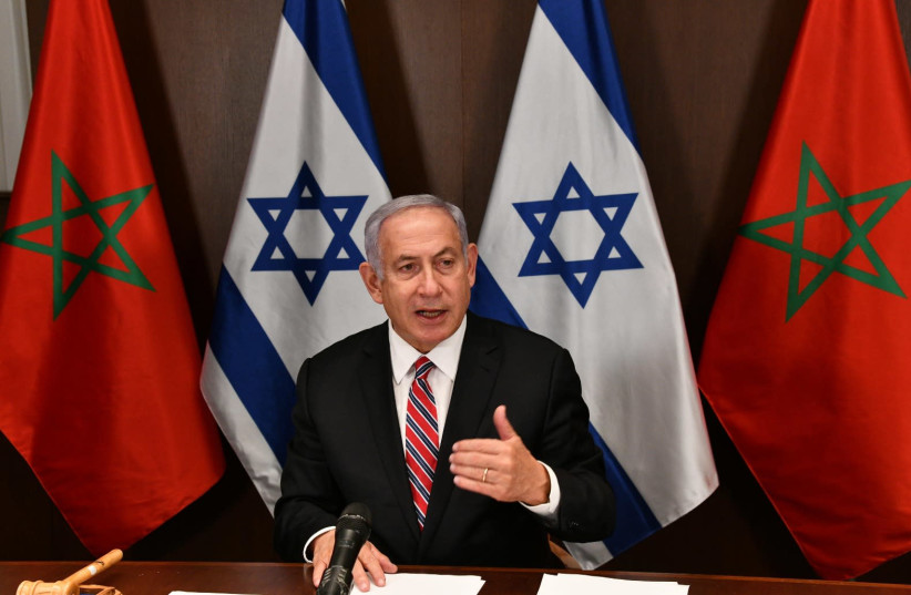 Prime Minister Benjamin Netanyahu and the government's cabinet formalizes the normalization agreement with Morocco. (photo credit: CHAIM TZACH/GPO)