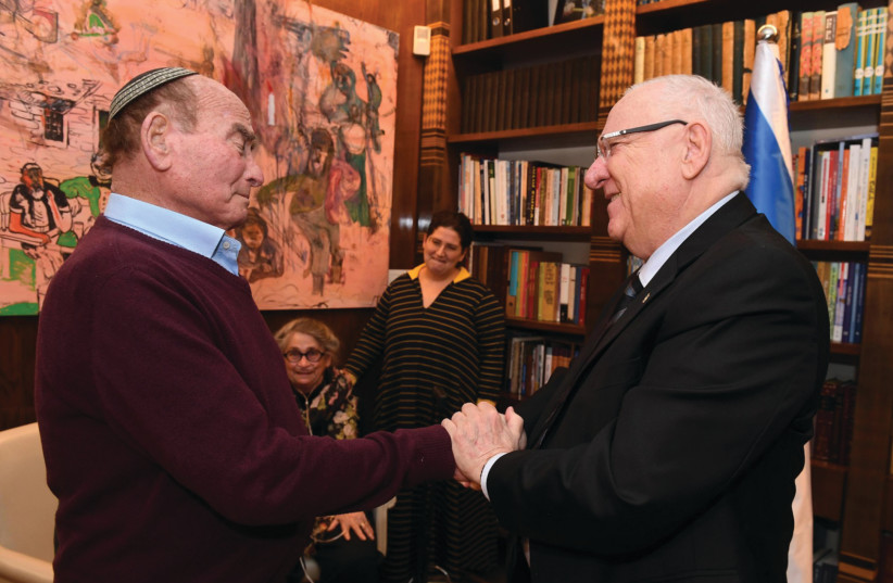 President Reuven (Ruvi) Rivlin hosts Holocaust survivor David “Dugo” Leitner and his family on January 19, 2019, to a falafel lunch (photo credit: Mark Neiman/GPO)