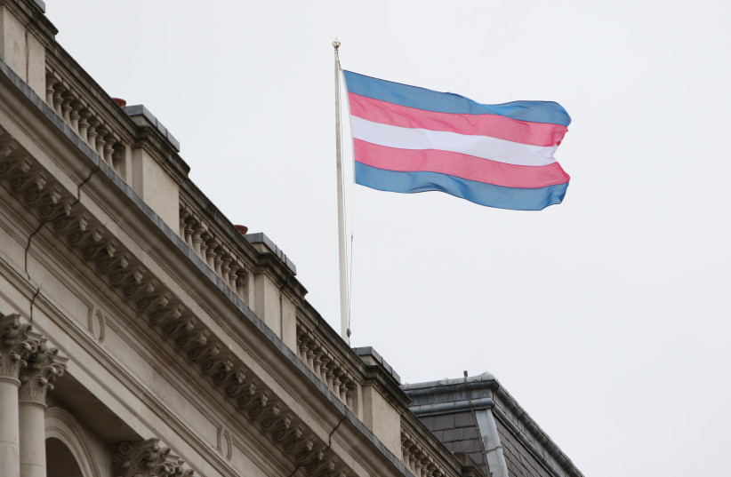 The Transgender Pride Flag flies on the Foreign Office building in London on Transgender Day of Remembrance, 20 November 2017. (photo credit: FOREIGN COMMONWEALTH & DEVELOPMENT OFFICE)