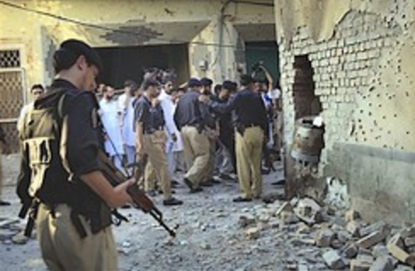 Pakistan police at scene of attack248.88 (photo credit: )