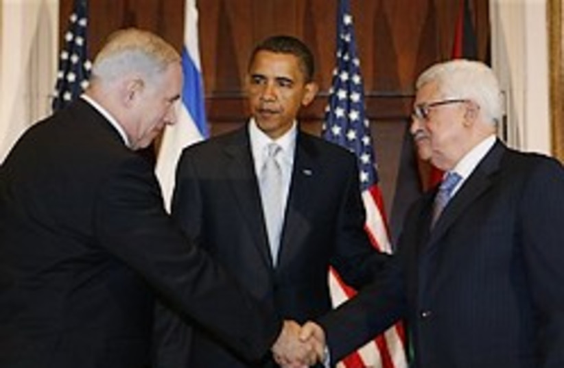 netanyahu abbas shake hands 248 88 (photo credit: )
