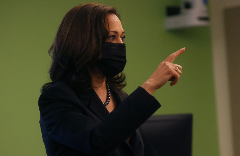  U.S. Vice President Kamala Harris talks with students during a visit to George Mason University to discuss voting rights and registration in Fairfax, Virginia, (photo credit: LEAH MILLIS/REUTERS)
