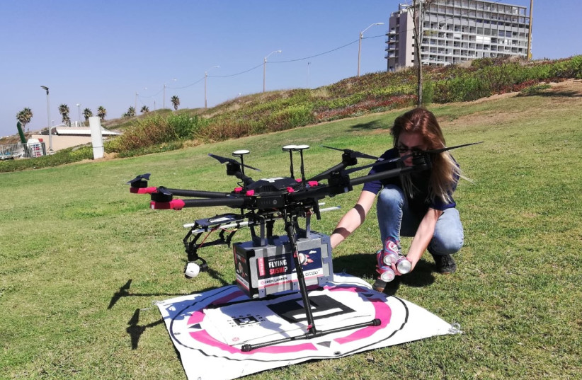  A drone delivers sushi to waiting recipients in the Tel Aviv area, October 11 2021  (photo credit: ZEV STUB)