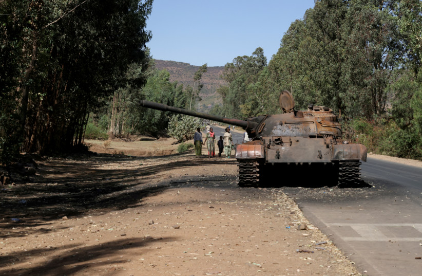  A burned tank stands near the town of Adwa, Tigray region, Ethiopia, March 18, 2021 (photo credit: BAZ RATNER/REUTERS)
