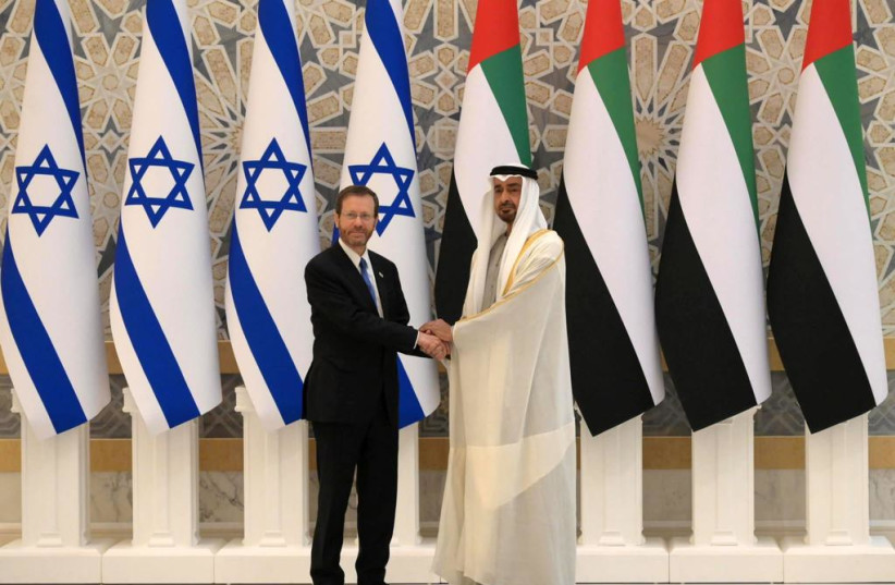  Israeli President Isaac Herzog and then UAE Crown Prince Mohammed bin Zayed Al Nahyan meet in Abu Dhabi, Jan. 30, 2022.  (photo credit: AMOS BEN-GERSHOM/GPO)
