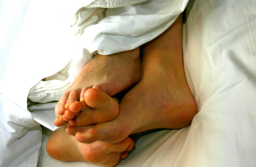  A couple in bed together, sex (Illustrative) (photo credit: Wikimedia Commons)
