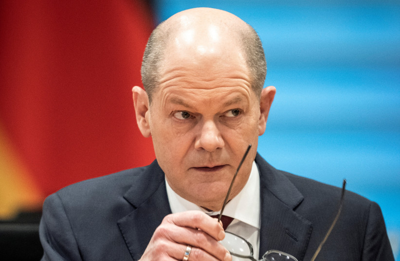  German Chancellor Olaf Scholz attends a meeting of the Federal security cabinet on the Ukraine crisis in Berlin, Germany, March 4, 2022. (photo credit: MICHAEL KAPPELER/POOL VIA REUTERS)