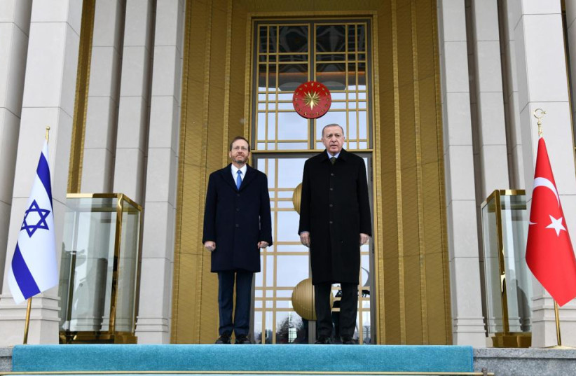 President Isaac Herzog met with Turkish President Recept Tayyip Erdogan in Ankara March 9, 2022. (photo credit: CHAIM TZACH/GPO)