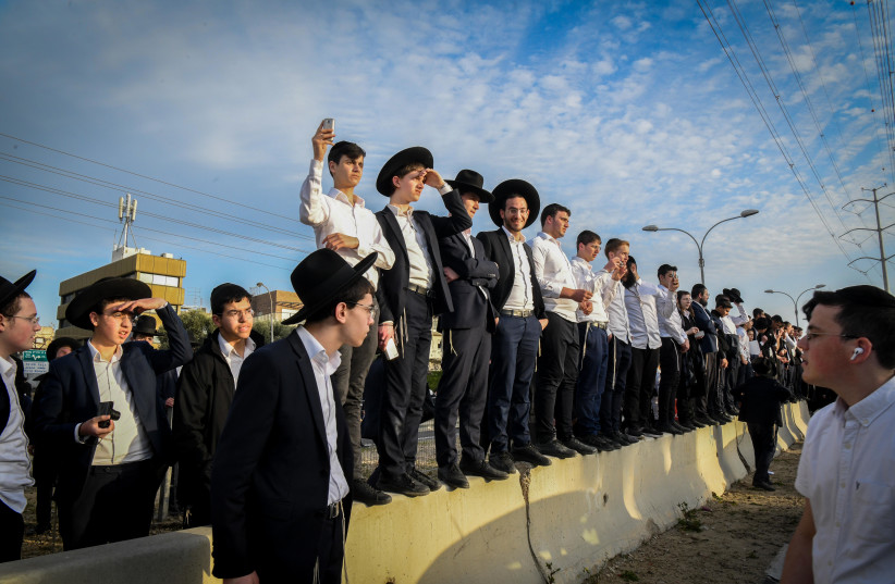  Ultra orthodox Jews protest against the arrest of ultra orthodox Jewish men who failed to comply with their army draft, in Bnei Brak, March 8, 2022. (photo credit: FLASH90)