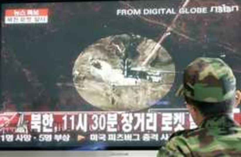 north korea missile (photo credit: AP)