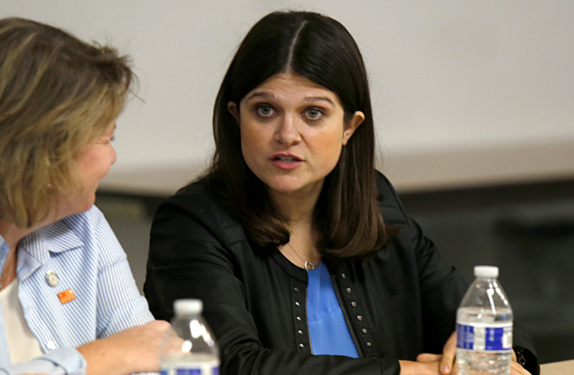 US Congresswoman Haley Stevens listens during a "End The Gun Violence" Town Hall in Commerce Township, Michigan, US, October 1, 2019. (photo credit: REUTERS/REBECCA COOK)