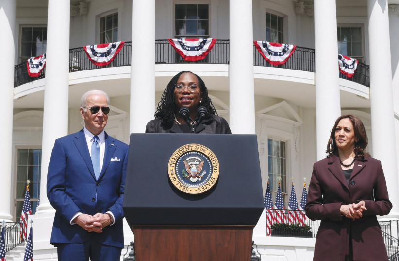  JUDGE KETANJI Brown Jackson is flanked by US President Joe Biden and Vice President Kamala Harris at the White House as she delivers remarks last week on her confirmation to the Supreme Court. (photo credit: KEVIN LAMARQUE/REUTERS)