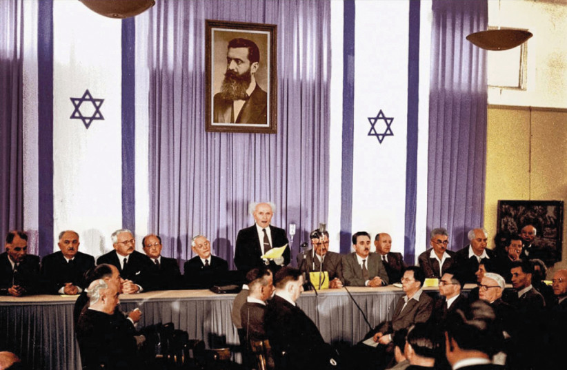  A colorized image of David Ben-Gurion reading Israel’s Declaration of Independence in Tel Aviv on May 14, 1948. (photo credit: ad-design.co.il/ZOLTAN KLUGER/GPO)