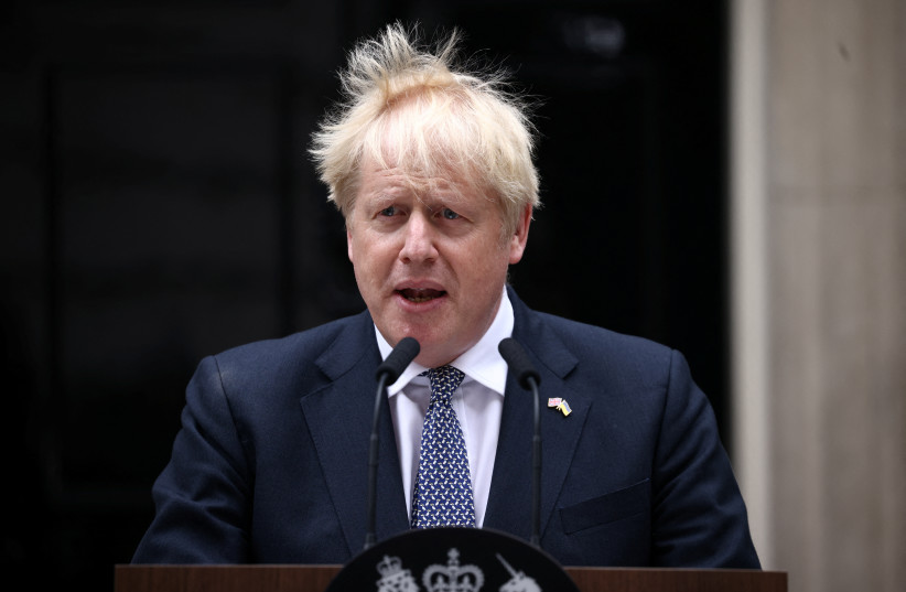 British Prime Minister Boris Johnson makes a statement at Downing Street in London, Britain. (photo credit: REUTERS/HENRY NICHOLLS)