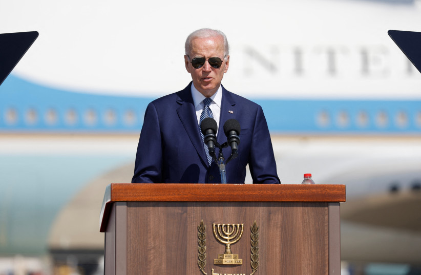 US President Joe Biden delivers remarks during an arrival ceremony at the Ben Gurion International Airport in Lod, near Tel Aviv, Israel, July 13, 2022 (photo credit: REUTERS/AMIR COHEN)