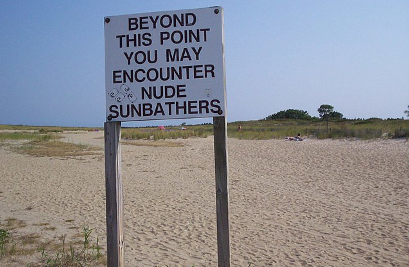  Sign outside a nudist beach in New Jersey; illustrative. (photo credit: WIKIMEDIA)