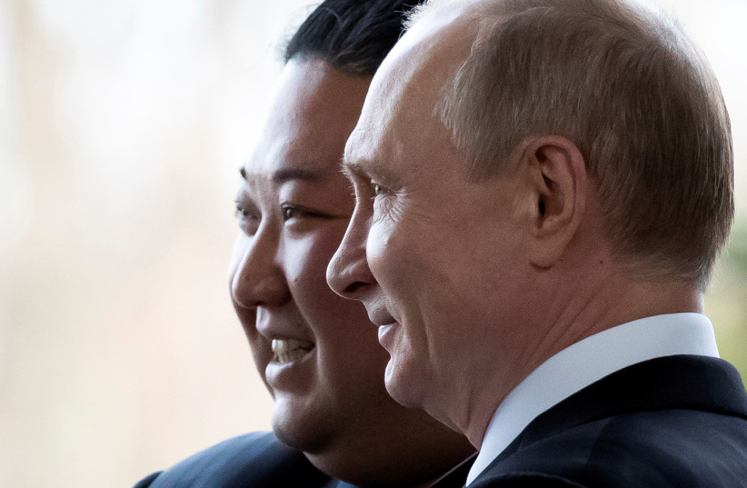 Russian President Vladimir Putin and North Korea's leader Kim Jong Un pose for a photo during their meeting in Vladivostok, Russia, April 25, 2019. (photo credit: ALEXANDER ZEMLIANICHENKO/POOL VIA REUTERS)