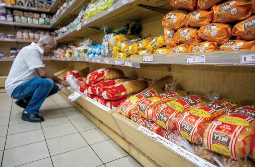  CHOOSING BETWEEN bread and milk: 47% of Jerusalemites live below the poverty line (Illustrative).  (photo credit: FLASH90)