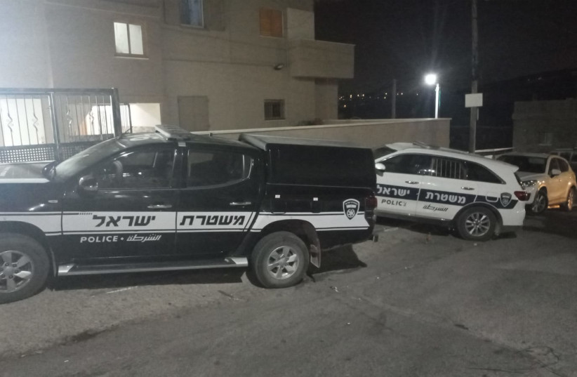  Israel Police cars are seen at the crime scene at Nahf, northern Israel on September 7, 2022 (photo credit: ISRAEL POLICE)