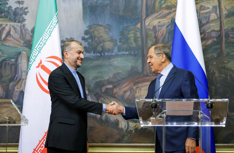  Russian Foreign Minister Sergei Lavrov shakes hands with Iranian Foreign Minister Hossein Amir-Abdollahian during a joint news conference in Moscow, Russia August 31, 2022. (photo credit: REUTERS/MAXIM SHEMETOV/POOL)