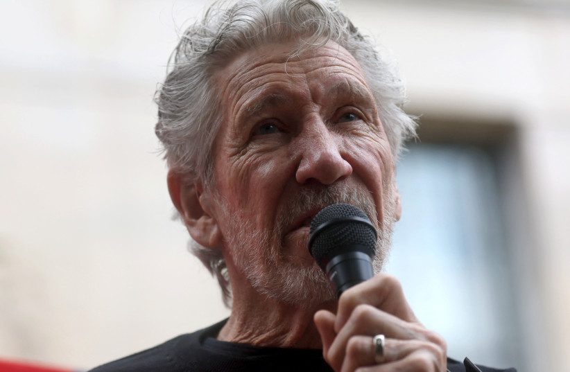 Roger Waters speaks during a #FreeAssange rally to urge US Attorney General Merrick Garland to drop all charges against WikiLeaks founder Julian Assange, outside of the U.S. Department of Justice building in Washington, US, August 17, 2022. (photo credit: REUTERS/LEAH MILLIS)