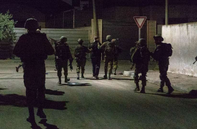  IDF, Shin Bet and Border Police forces operated in several locations in the West Bank during Sunday night, among others in the villages of Sa'ir and Shuyukh, arresting a total of 16 suspects (photo credit: IDF SPOKESPERSON UNIT)
