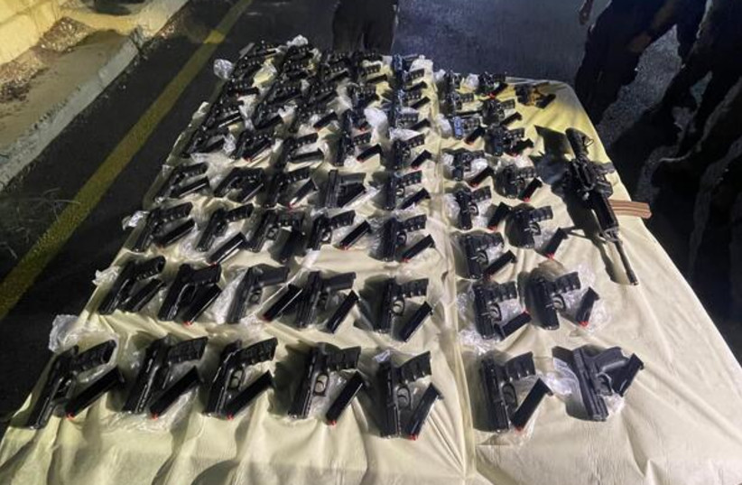 Smuggled guns seized by the IDF and Israel Police near the border with Jordan, October 3, 2022 (photo credit: IDF SPOKESPERSON'S UNIT)