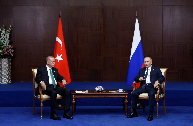 Russia's President Vladimir Putin and Turkey's President Tayyip Erdogan meet on the sidelines of the 6th summit of the Conference on Interaction and Confidence-building Measures in Asia (CICA), in Astana, Kazakhstan October 13, 2022. (photo credit: Sputnik/Vyacheslav Prokofyev/Pool via Reuters)