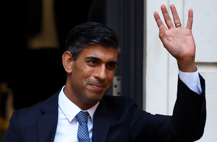  New leader of the Britain's Conservative Party Rishi Sunak walks outside the Conservative Campaign Headquarters, in London, Britain October 24, 2022. (photo credit: Hannah McKay/Reuters)