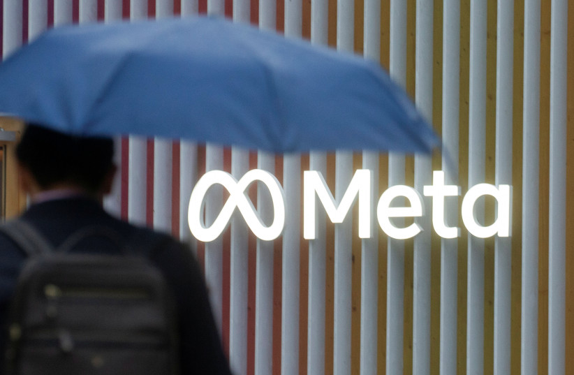  The logo of Meta Platforms is seen in Davos, Switzerland, May 22, 2022.  (photo credit: REUTERS/ARND WIEGMANN)