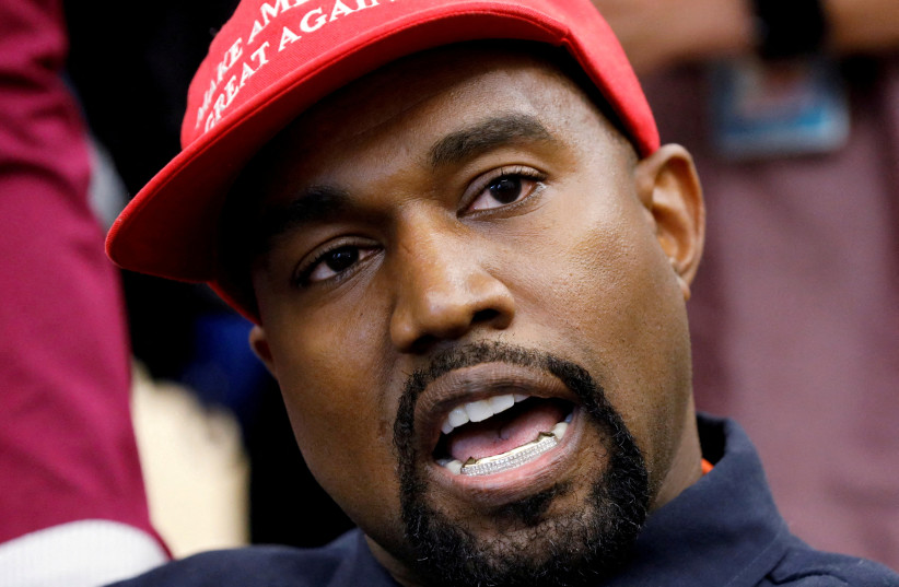 Rapper Kanye West speaks during a meeting with US President Donald Trump to discuss criminal justice reform in the Oval Office of the White House in Washington, US, October 11, 2018. (photo credit: REUTERS/KEVIN LAMARQUE/FILE PHOTO)