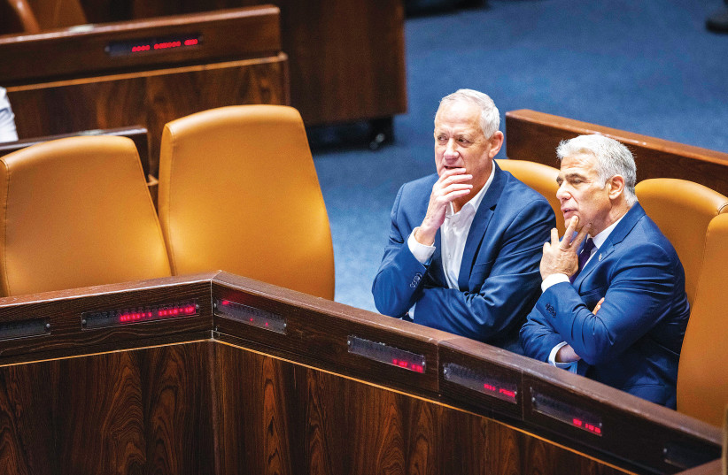  YAIR LAPID and Benny Gantz in the Knesset. (photo credit: OLIVER FITOUSSI/FLASH90)