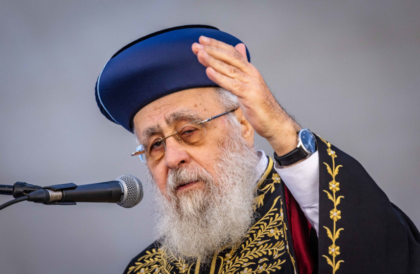 Israel's Sephardi Chief Rabbi Yitzhak Yosef speaks during a ceremony of the Israeli police for the Jewish new year at the National Headquarters of the Israel Police in Jerusalem on September 22, 2022. (photo credit: OLIVIER FITOUSSI/FLASH90)