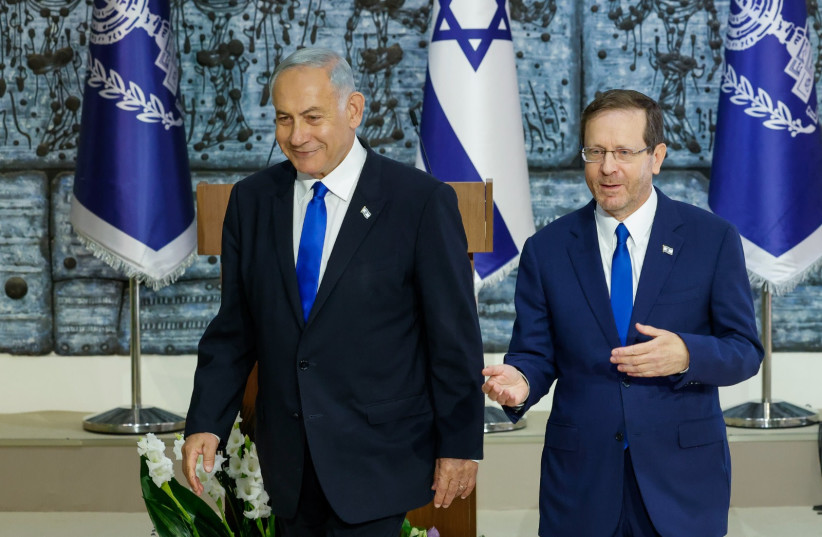  Benjamin Netanyahu (L) is seen having received the mandate to form a new government from Israeli President Isaac Herzog, at the President's Residence in Jerusalem, on November 13, 2022. (photo credit: MARC ISRAEL SELLEM/THE JERUSALEM POST)